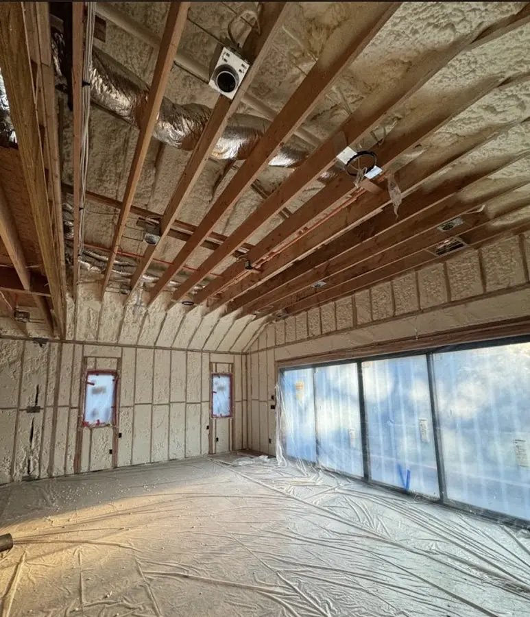 Interior walls and ceiling insulated with spray foam during new construction in Connellsville
